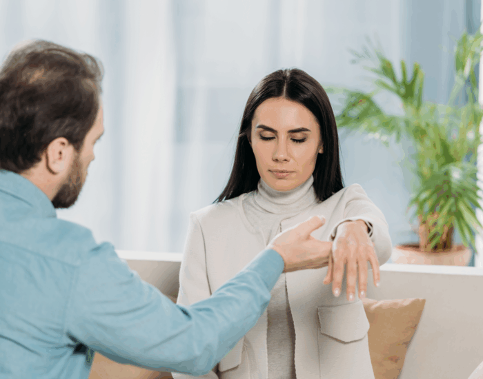 Hypnosis-client Coach guiding client through ethical hypnosis session in calm, grounded space